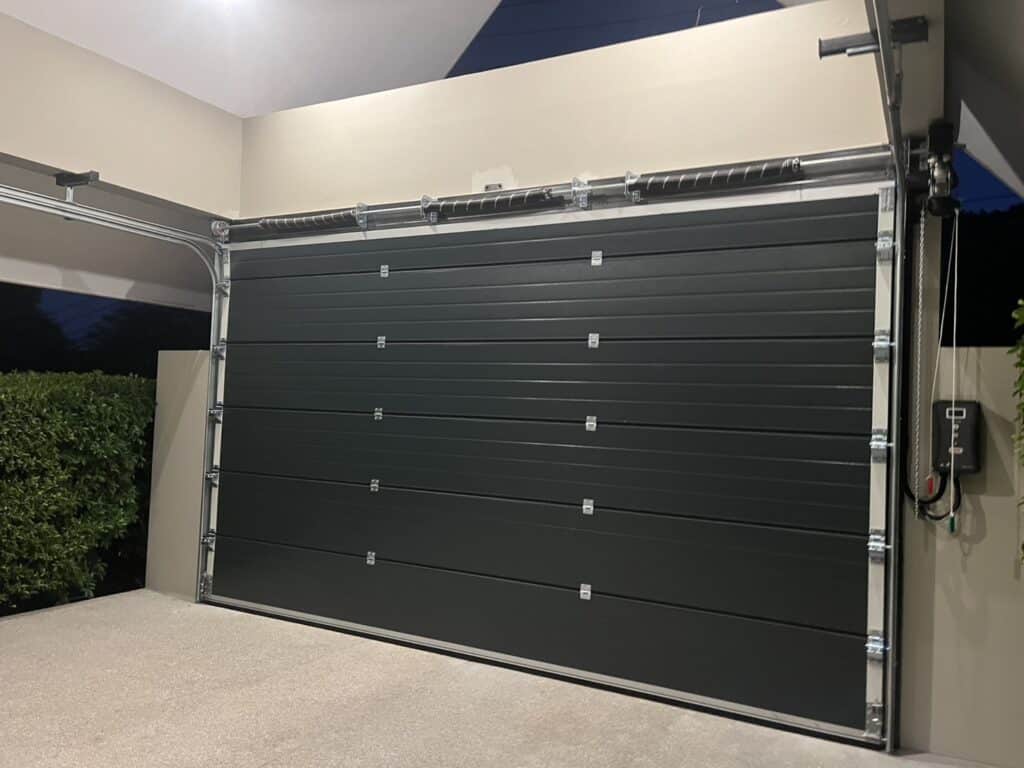 Installation photo of Standard Garage Door for Single House in Surat Thani by OZ DOOR