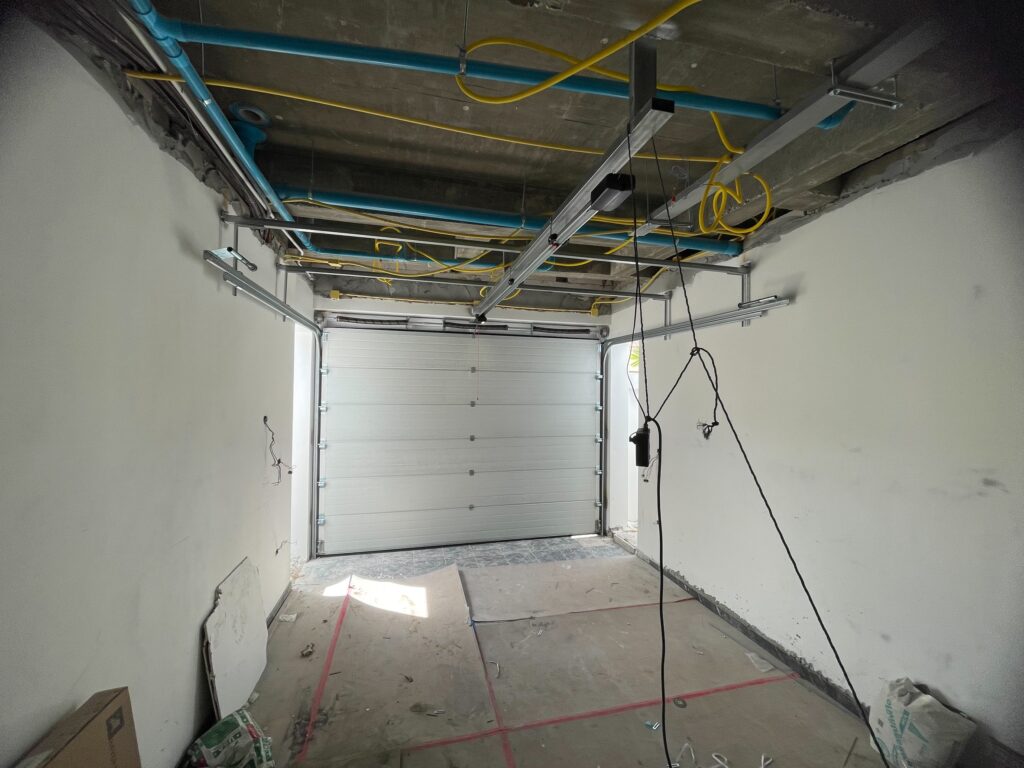 Installation photo of Standard Garage Door for Single House in Chonburi by OZ DOOR (4)