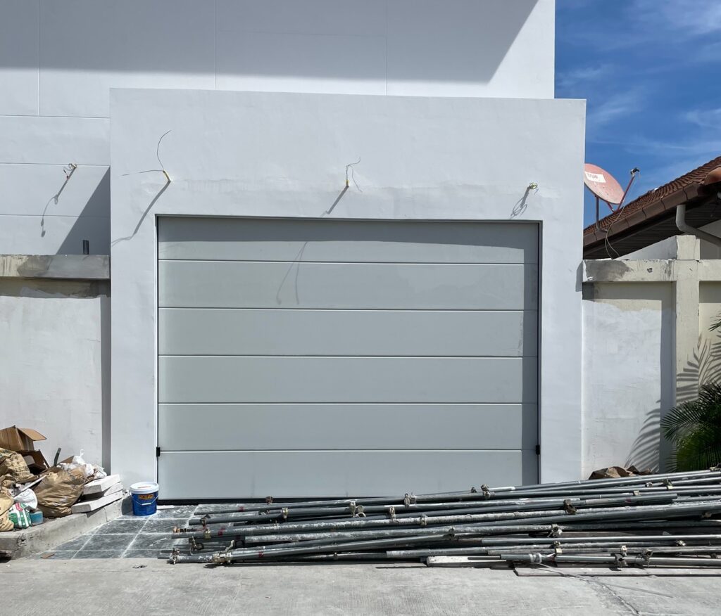 Installation photo of Standard Garage Door for Single House in Chonburi by OZ DOOR