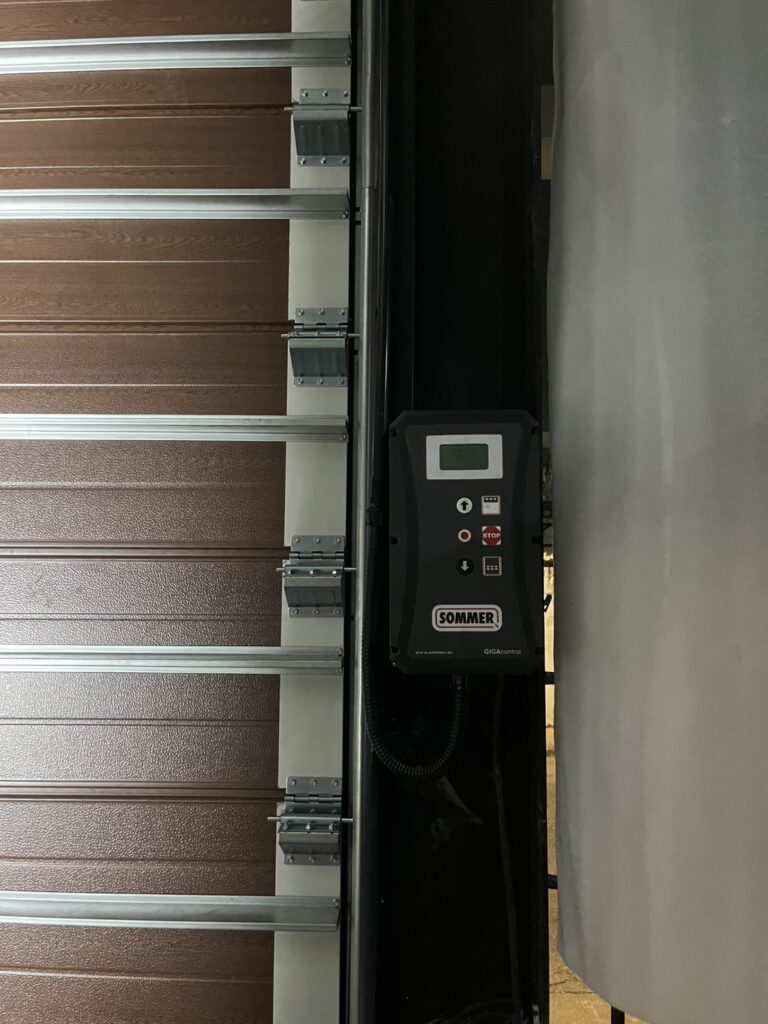 Installation photo of Standard Garage Door for Single House in Bangkok by OZ DOOR (5)