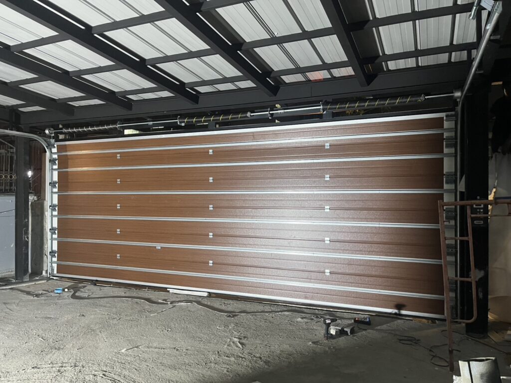 Installation photo of Standard Garage Door for Single House in Bangkok by OZ DOOR (8)