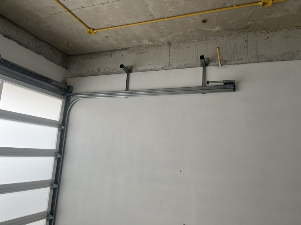 Installation photo of Full View Garage Door for Single House in Chonburi by OZ DOOR (3)