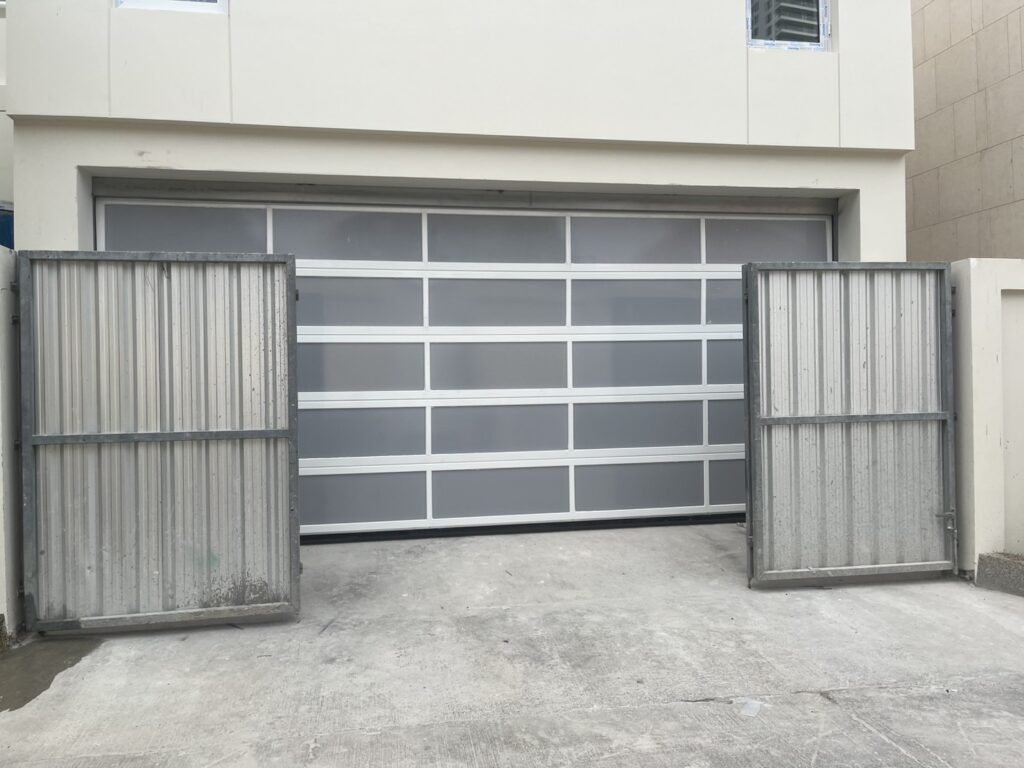 Installation photo of Full View Garage Door for Single House in Chonburi by OZ DOOR