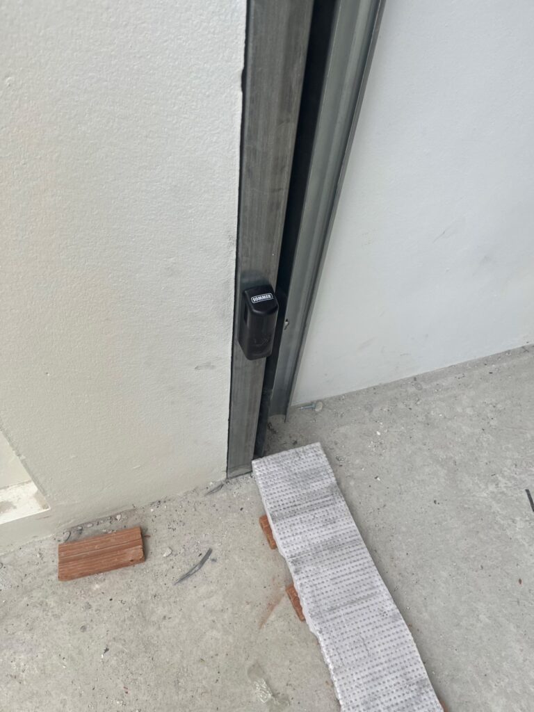 Installation photo of Full View Garage Door for Single House in Chonburi by OZ DOOR (5)