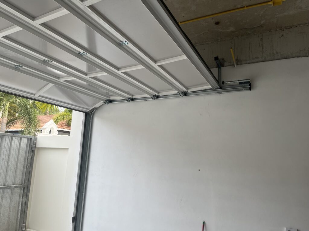 Installation photo of Full View Garage Door for Single House in Chonburi by OZ DOOR (7)