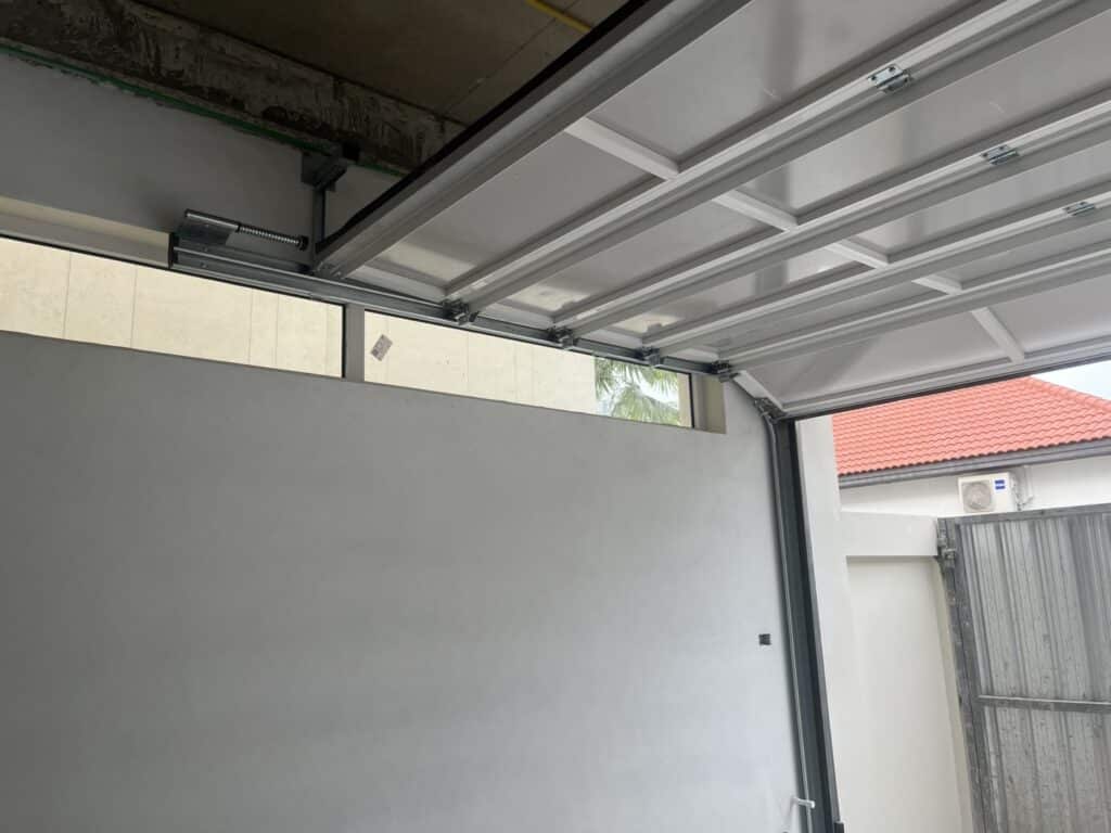 Installation photo of Full View Garage Door for Single House in Chonburi by OZ DOOR (8)