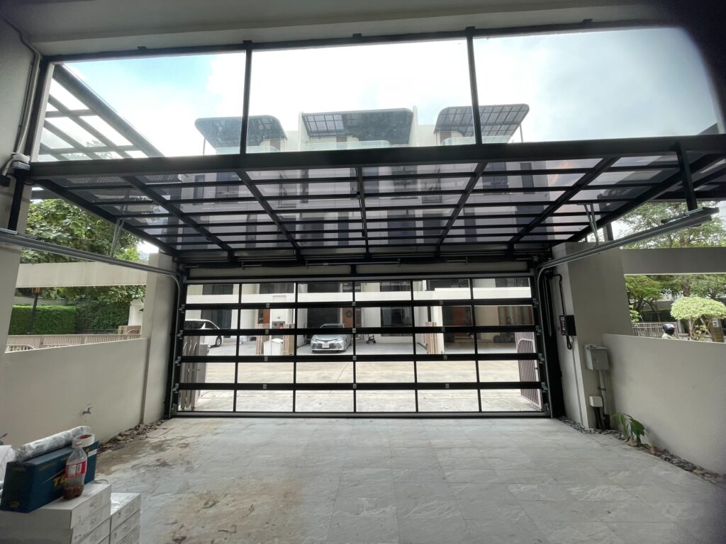 Installation photo of Full View Garage Door for Residential Projects in Bangkok by OZ DOOR (2)
