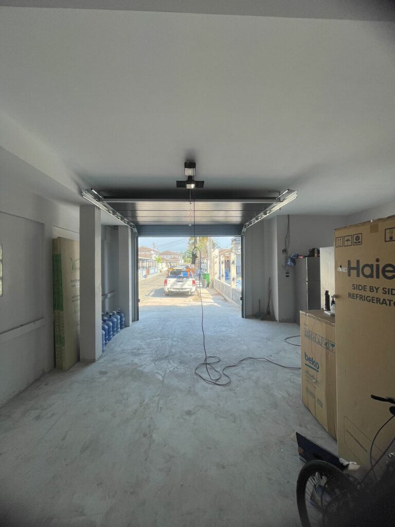 Installation photo of Standard Garage Door for Single House in Rayong by OZ DOOR (2)