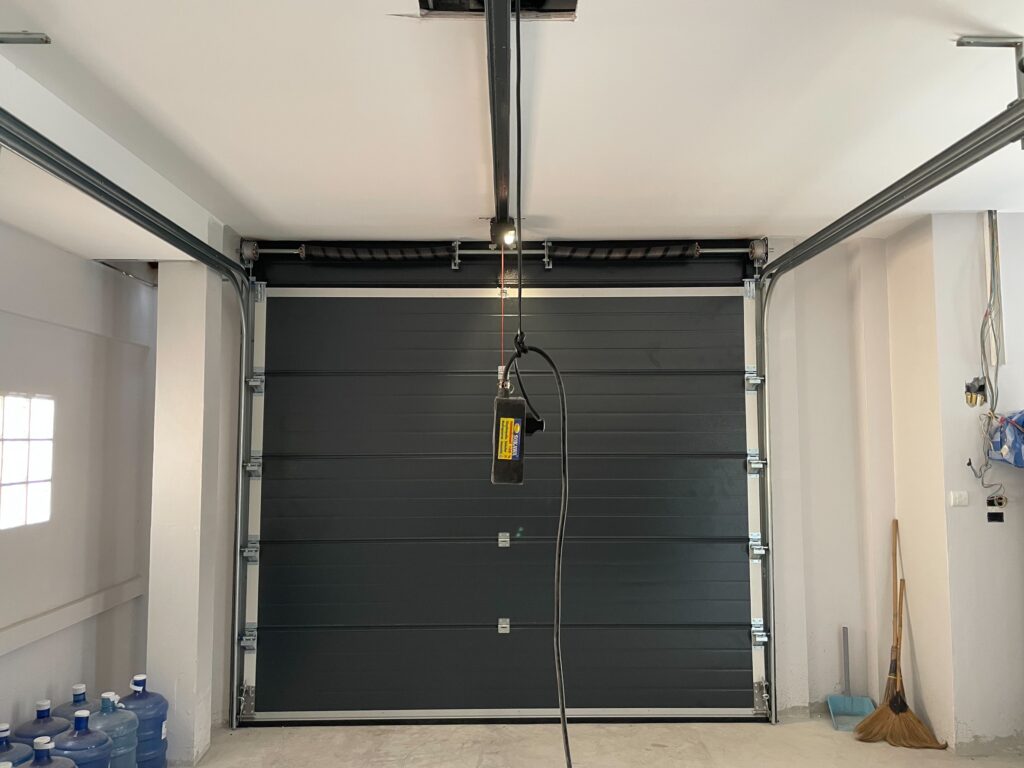 Installation photo of Standard Garage Door for Single House in Rayong by OZ DOOR (3)