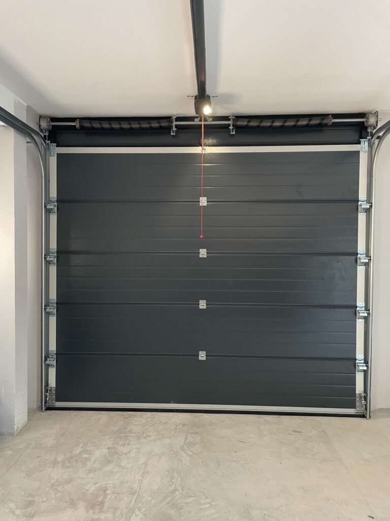 Installation photo of Standard Garage Door for Single House in Rayong by OZ DOOR (6)