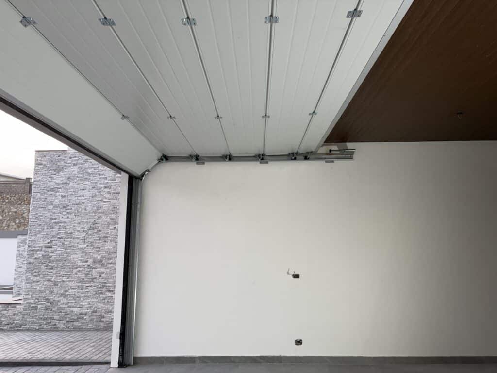 Installation photo of Standard Garage Door for Housing Estate / Developer in Chonburi by OZ DOOR (8)