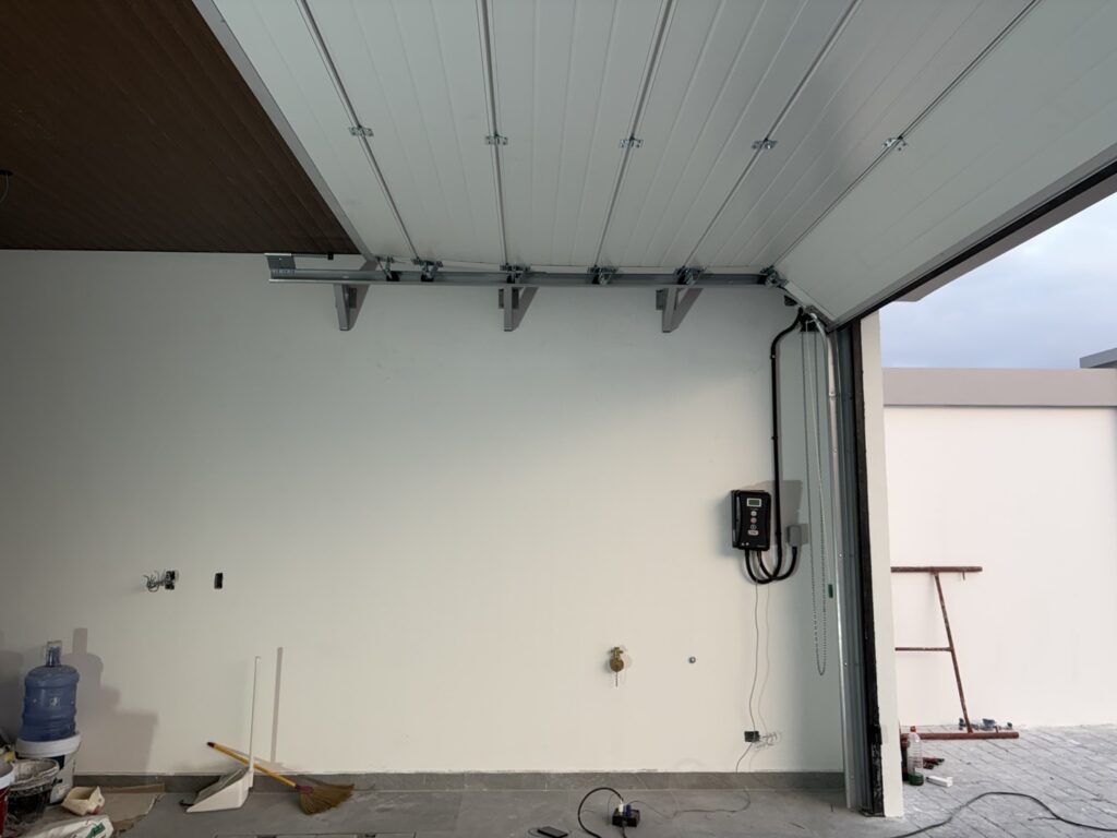 Installation photo of Standard Garage Door for Housing Estate / Developer in Chonburi by OZ DOOR (9)