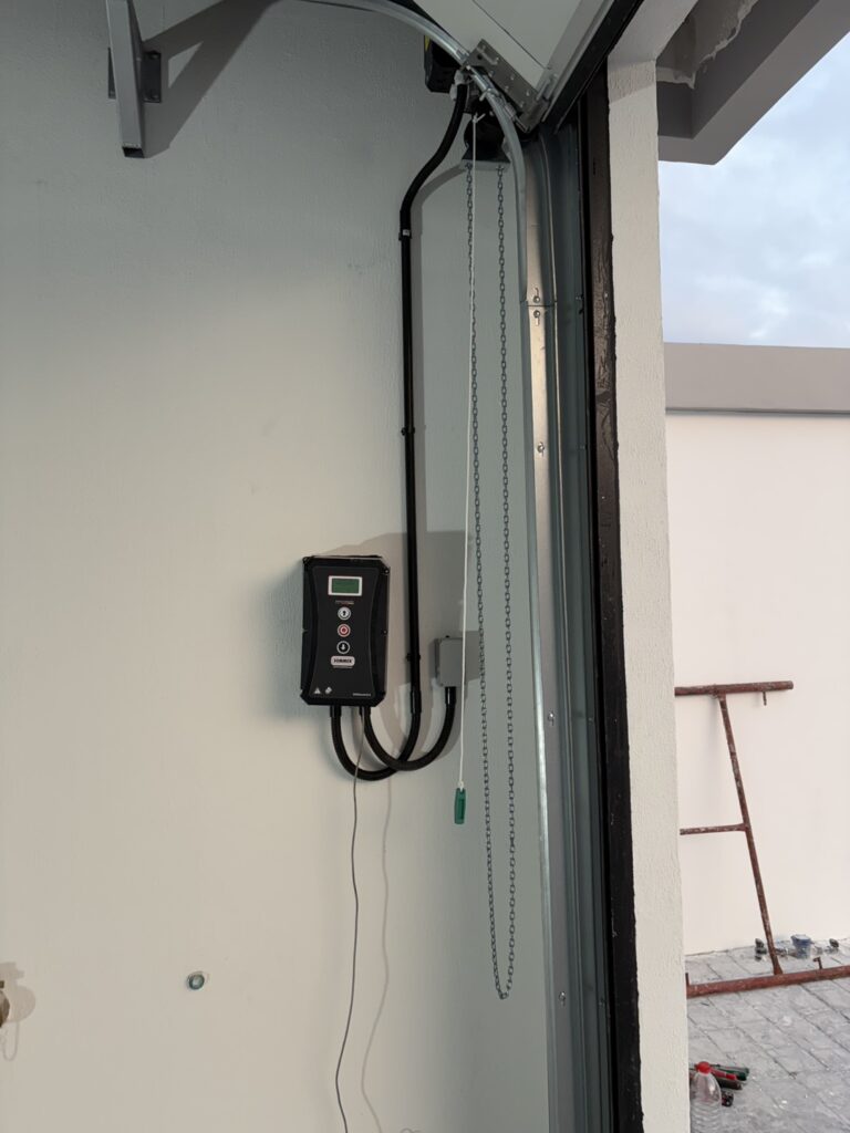 Installation photo of Standard Garage Door for Housing Estate / Developer in Chonburi by OZ DOOR (10)