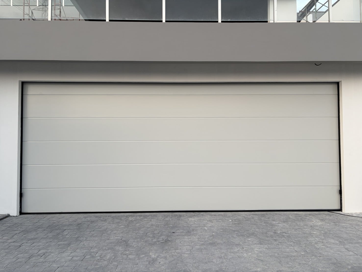 Installation photo of Standard Garage Door for Housing Estate / Developer in Chonburi by OZ DOOR