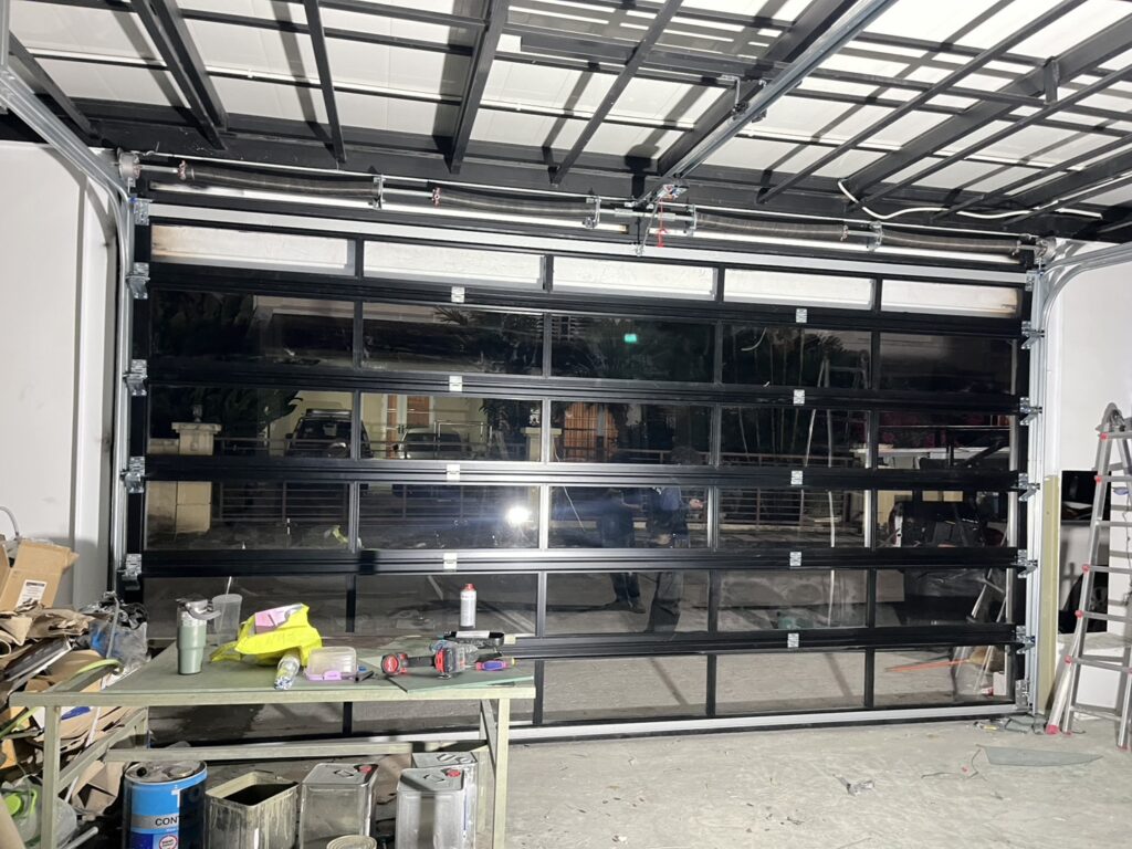 Installation photo of Full View Garage Door for Single House in Bangkok by OZ DOOR (2)