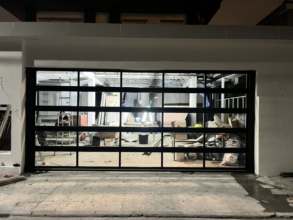 Installation photo of Full View Garage Door for Single House in Bangkok by OZ DOOR
