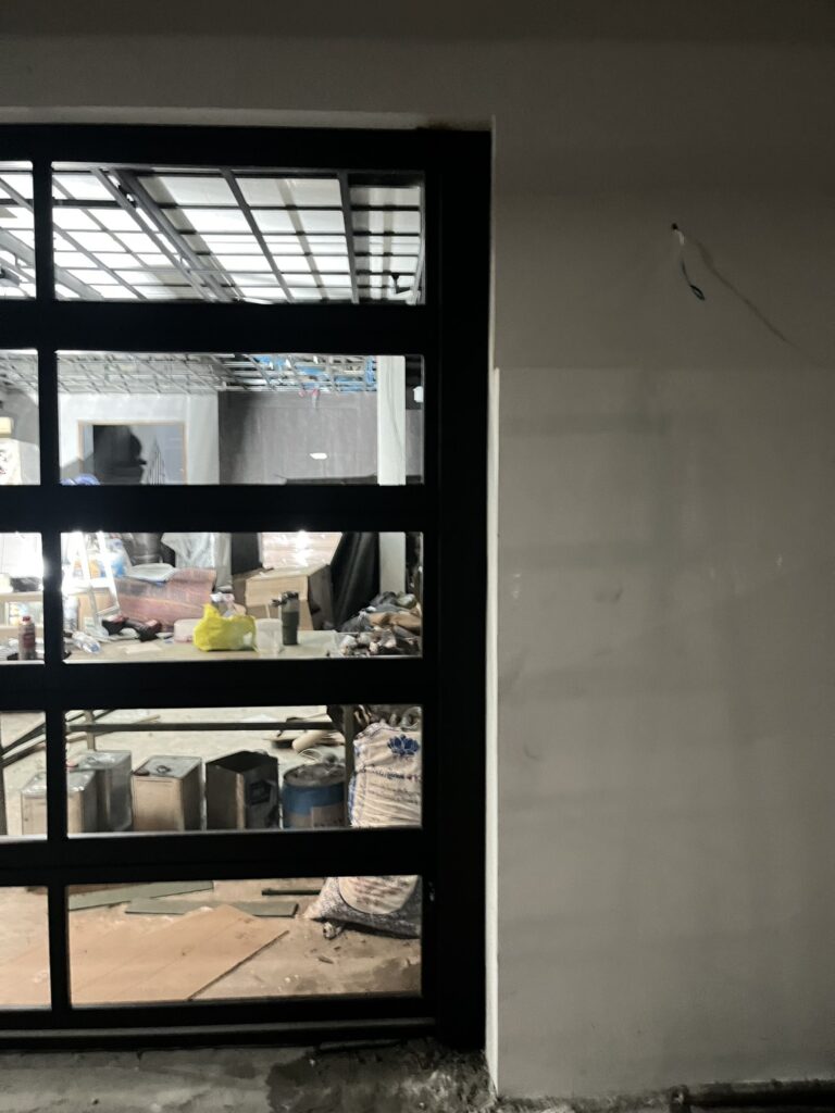 Installation photo of Full View Garage Door for Single House in Bangkok by OZ DOOR (8)