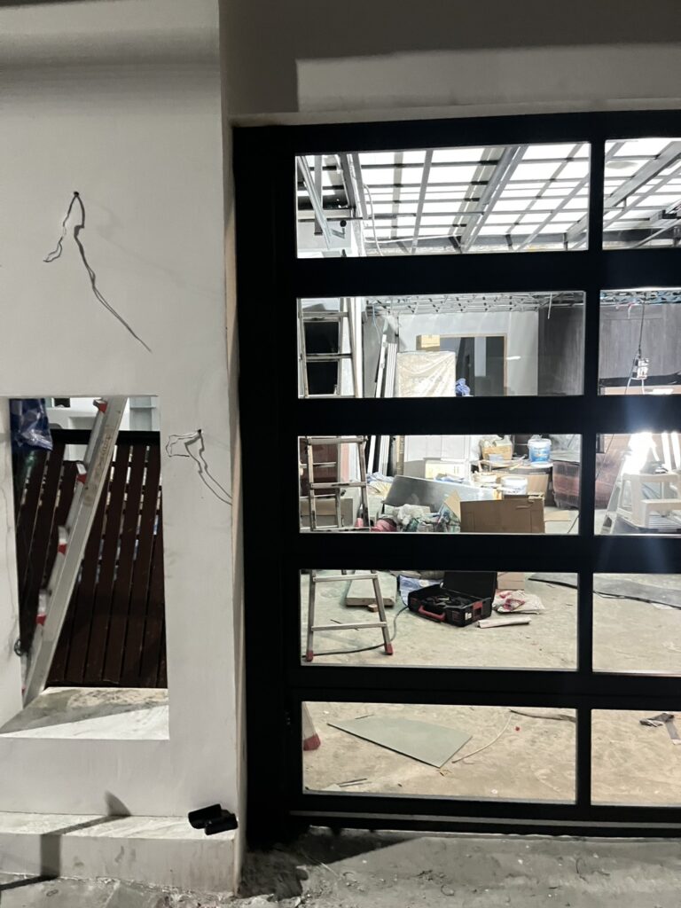 Installation photo of Full View Garage Door for Single House in Bangkok by OZ DOOR (9)