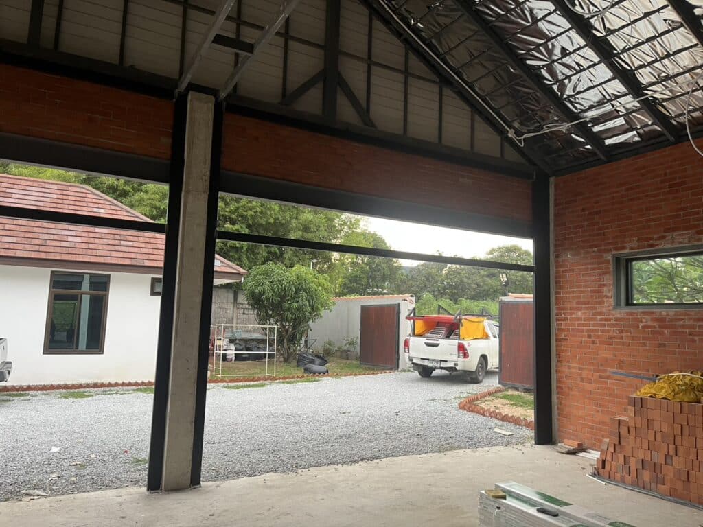 Installation photo of Standard Garage Door for Single House in Chonburi by OZ DOOR (3)