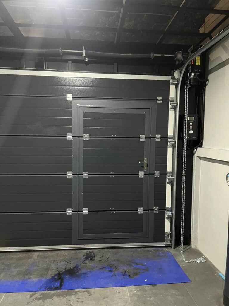 Installation photo of Standard Garage Door for Single House in Bangkok by OZ DOOR (7)