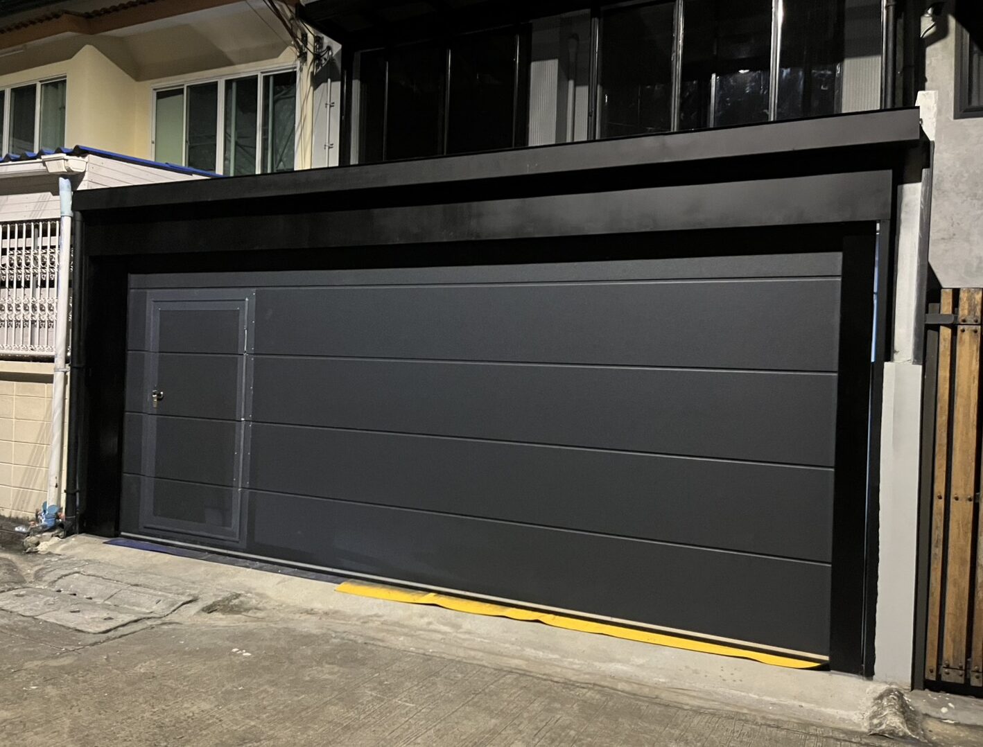 Installation photo of Standard Garage Door for Single House in Bangkok by OZ DOOR