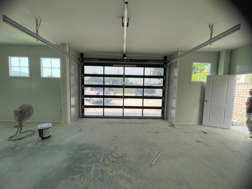 Installation photo of Full View Garage Door for Single House in Bangkok by OZ DOOR (2)