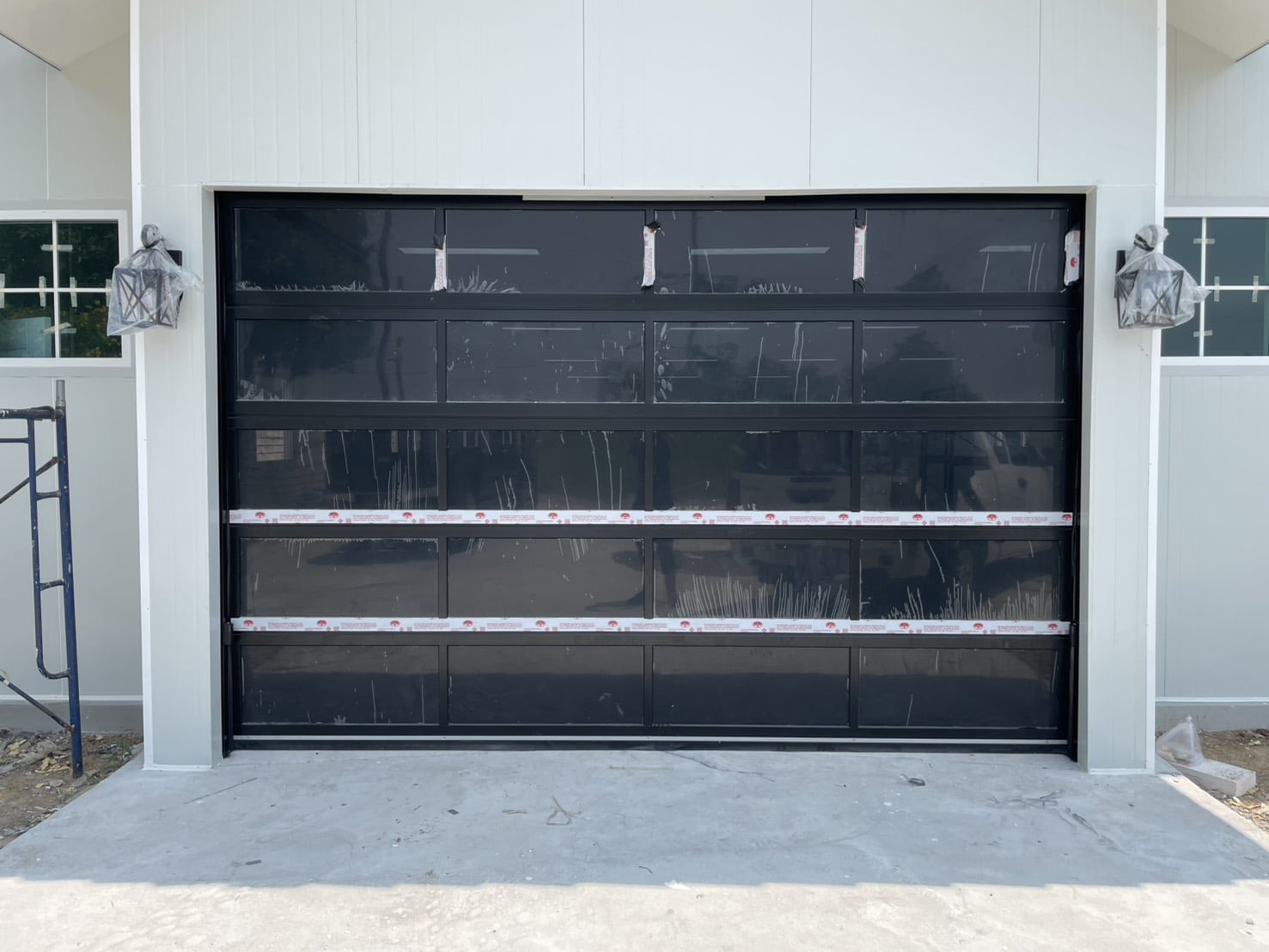 Installation photo of Full View Garage Door for Single House in Bangkok by OZ DOOR