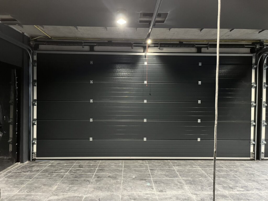 Installation photo of Standard Garage Door for Single House in Nonthaburi by OZ DOOR (7)