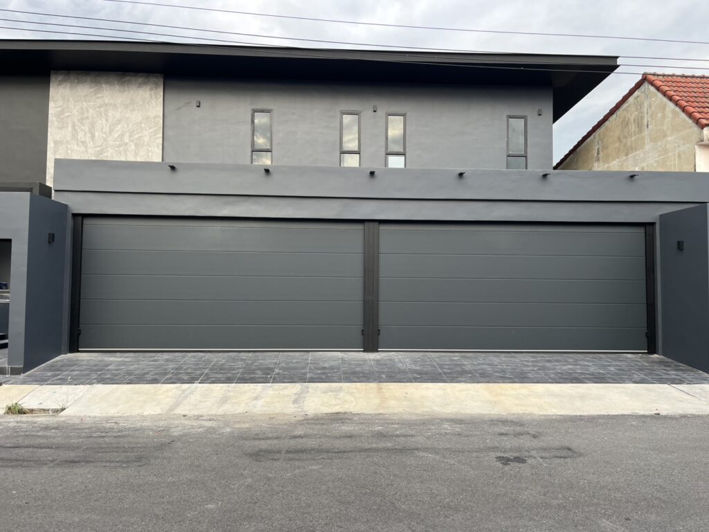 Installation photo of Standard Garage Door for Single House in Nonthaburi by OZ DOOR