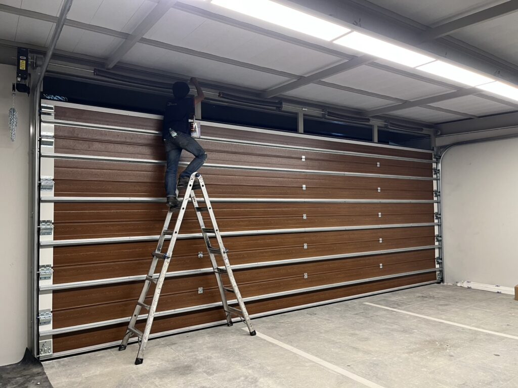 Installation photo of Standard Garage Door for Single House in Bangkok by OZ DOOR (2)