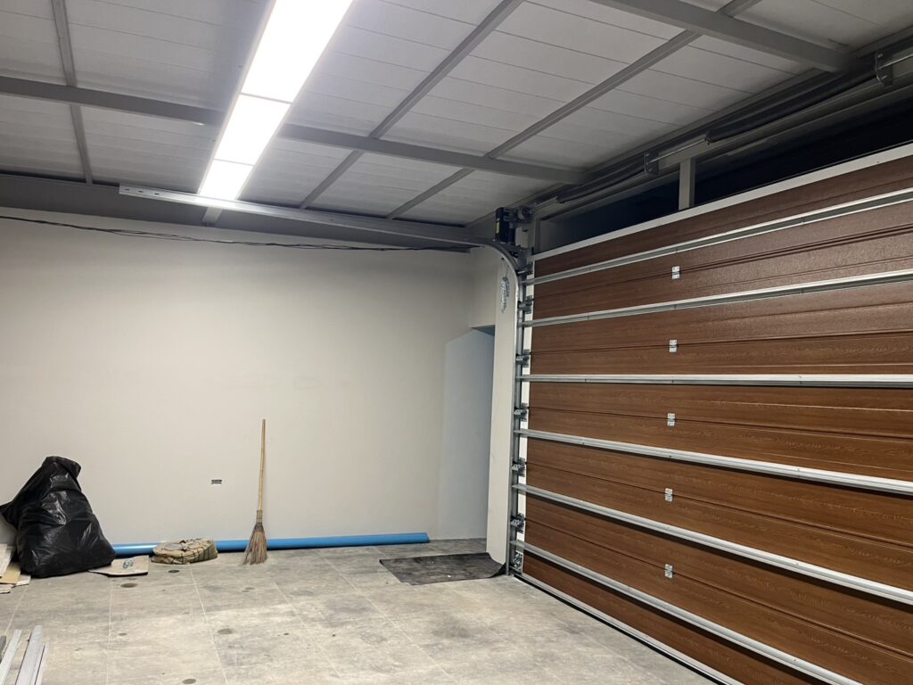 Installation photo of Standard Garage Door for Single House in Bangkok by OZ DOOR (5)