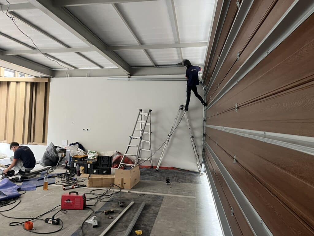 Installation photo of Standard Garage Door for Single House in Bangkok by OZ DOOR (8)