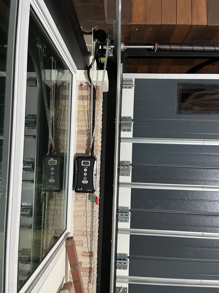 Installation photo of Standard Garage Door for Single House in Chonburi by OZ DOOR (3)