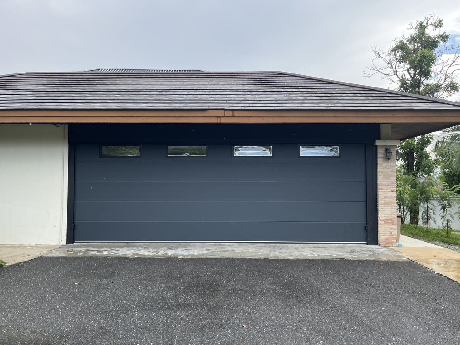 Installation photo of Standard Garage Door for Single House in Chonburi by OZ DOOR