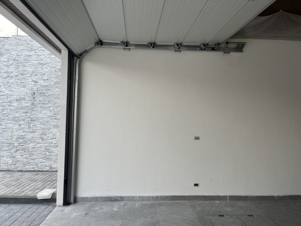 Installation photo of Standard Garage Door for Housing Estate / Developer in Chonburi by OZ DOOR (4)
