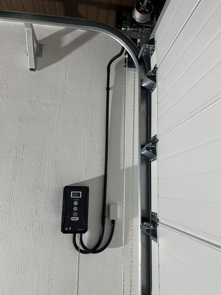 Installation photo of Standard Garage Door for Housing Estate / Developer in Chonburi by OZ DOOR (6)