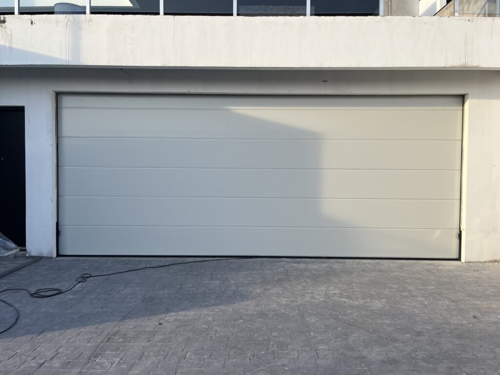 Installation photo of Standard Garage Door for Housing Estate / Developer in Chonburi by OZ DOOR