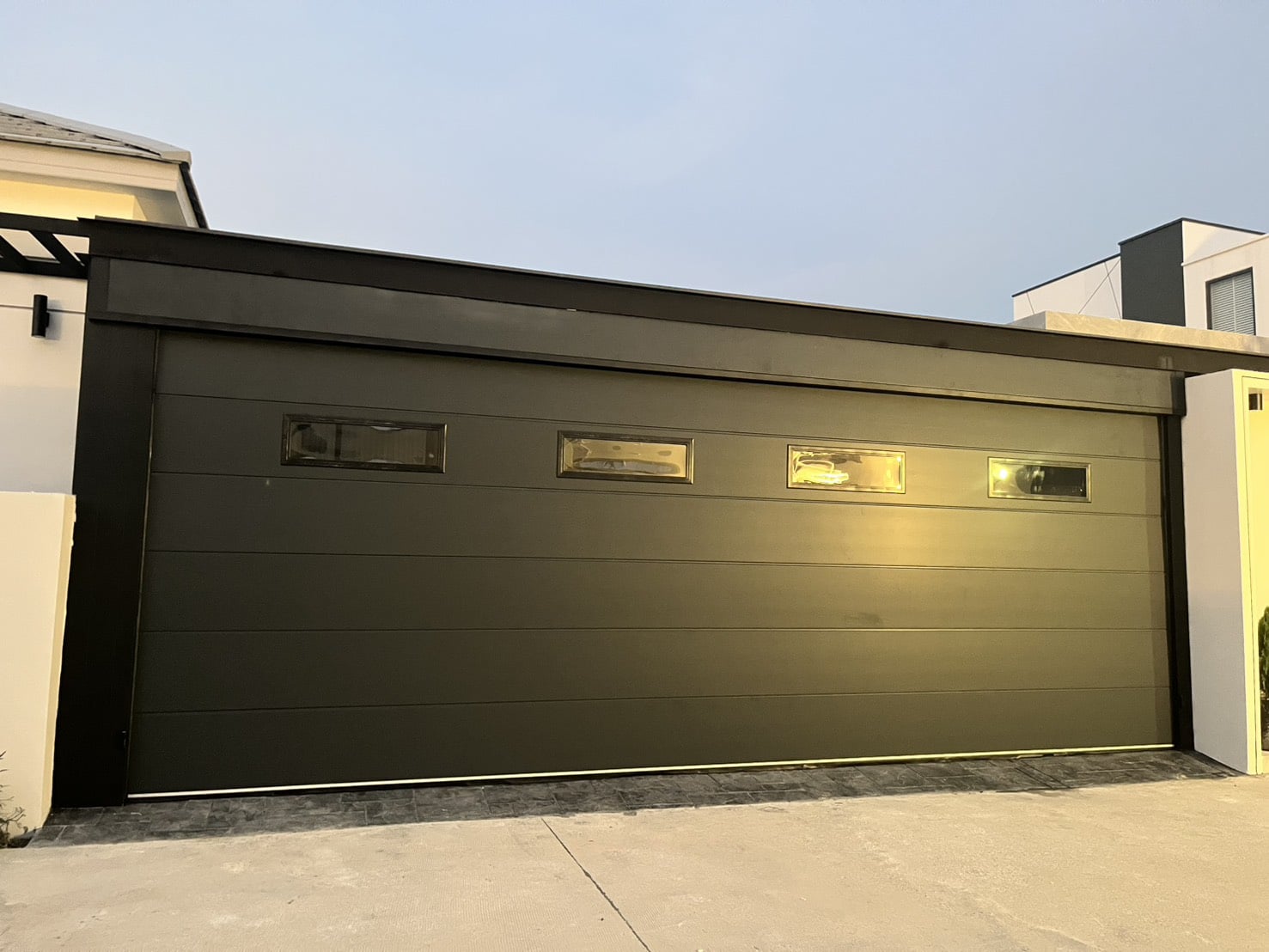 Installation photo of Standard Garage Door for Single House in Chonburi by OZ DOOR