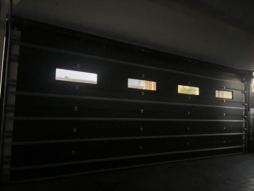 Installation photo of Standard Garage Door for Single House in Chonburi by OZ DOOR (2)