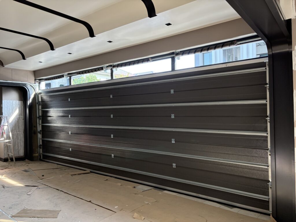 Installation photo of Standard Garage Door for Single House in Nonthaburi by OZ DOOR (2)
