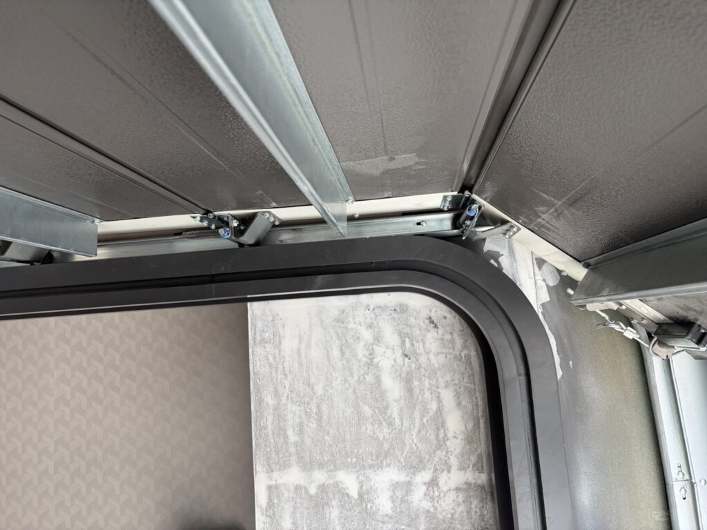 Installation photo of Standard Garage Door for Single House in Nonthaburi by OZ DOOR (10)