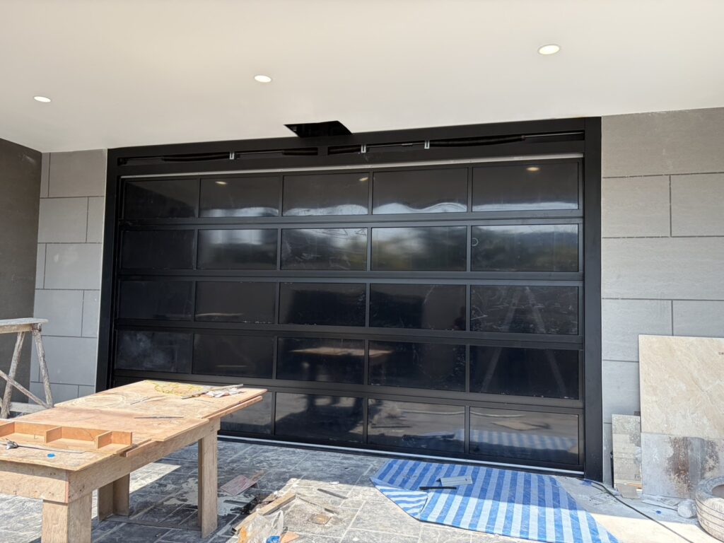 Installation photo of Full View Garage Door for Single House in Bangkok by OZ DOOR (5)