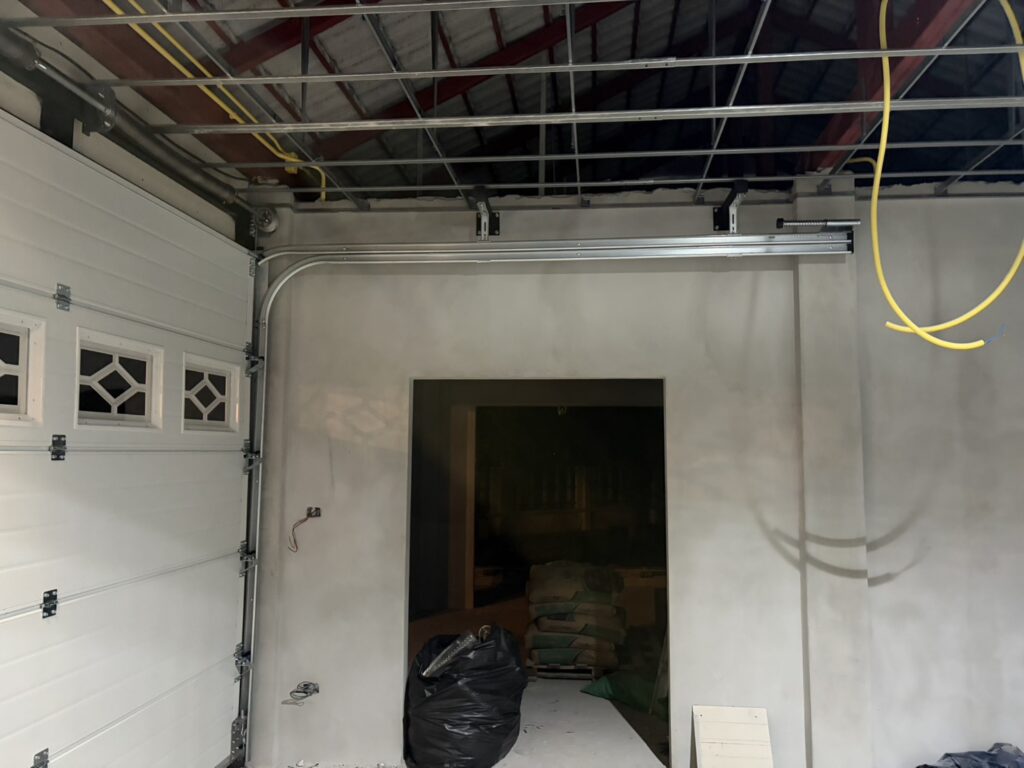 Installation photo of Standard Garage Door for Single House in Chaiyaphum by OZ DOOR (2)
