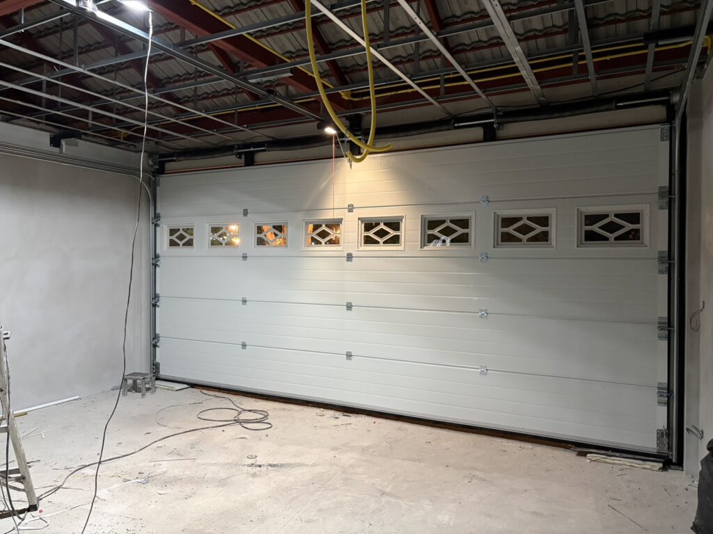 Installation photo of Standard Garage Door for Single House in Chaiyaphum by OZ DOOR (3)