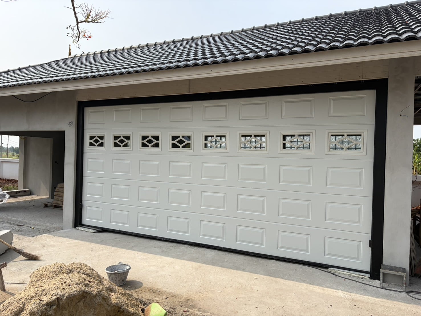 Installation photo of Standard Garage Door for Single House in Chaiyaphum by OZ DOOR