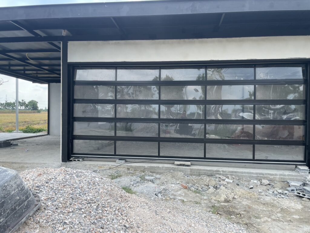 Installation photo of Full View Garage Door for Single House in Saraburi by OZ DOOR (3)