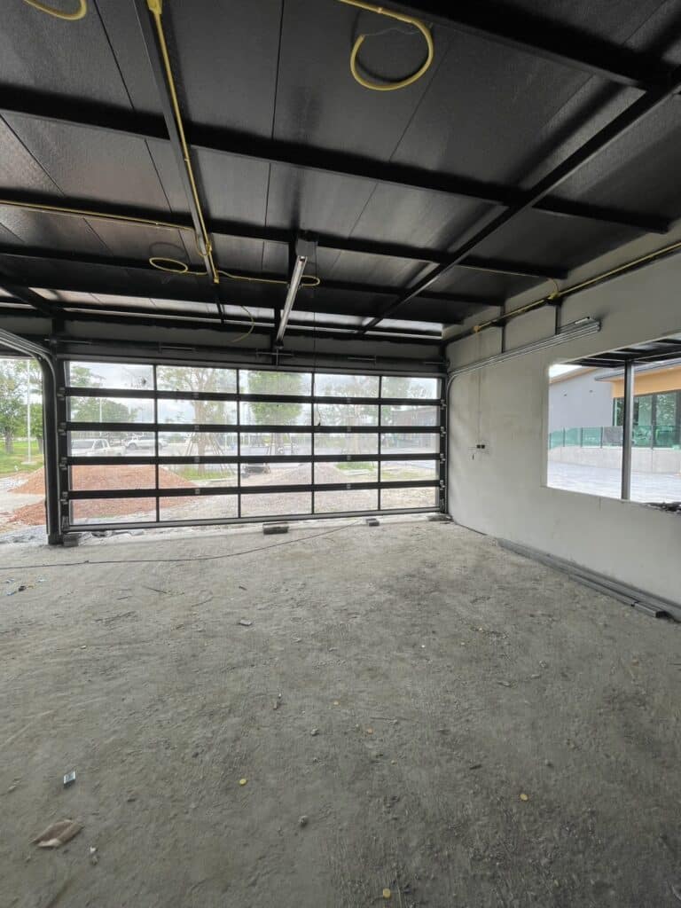 Installation photo of Full View Garage Door for Single House in Saraburi by OZ DOOR (4)