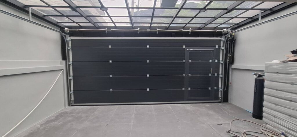 Installation photo of Standard Garage Door for Single House in Bangkok by OZ DOOR (2)