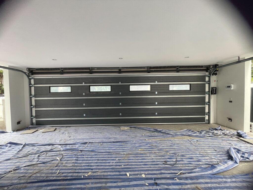 Installation photo of Standard Garage Door for Single House in Bangkok by OZ DOOR (5)