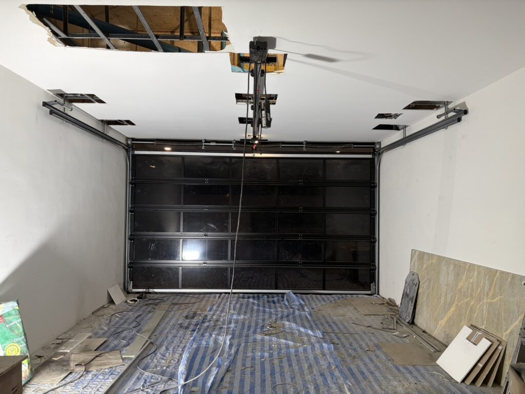 Installation photo of Garage Doors for Single House in Bangkok by OZ DOOR (2)